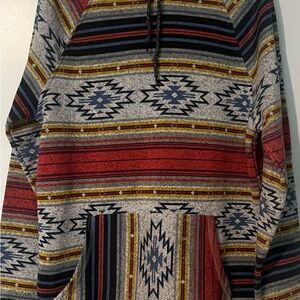 Unisex Brooklyn Cloth pullover hoodie with a Southwestern Aztec print
Large